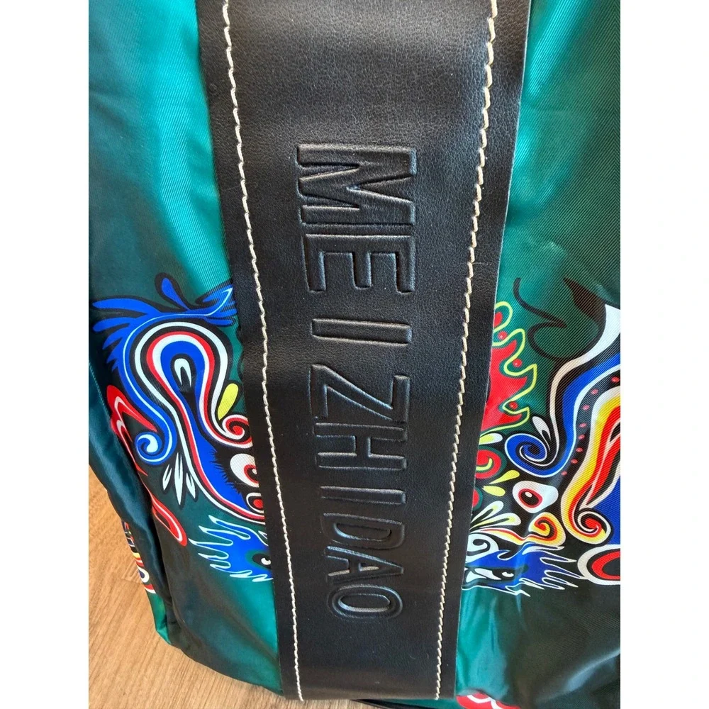 Meizhidao Teal Graphic Print Nylon Backpack Adjustable Straps Multi Color Bag